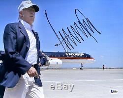 45TH PRESIDENT DONALD J. TRUMP SIGNED 11x14 PHOTO AMERICA MAGA BECKETT BAS