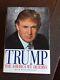 Donald Trump Signed. Trump The America We Deserve. 1st Ed With Maga Hat