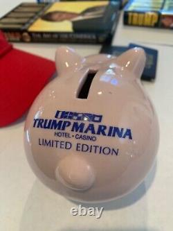 Donald Trump Books (1 signed), Hat, Casino Items, Bathrobe, Bobble Head Doll