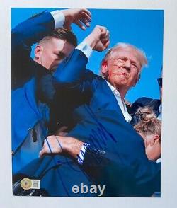 Donald Trump Signed ASSASSINATION Fist Pump 8 X 10 Photo Beckett BAS COA Fight