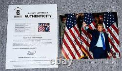 PRESIDENT DONALD J. TRUMP SIGNED 8x10 PHOTO 2024 MAKE AMERICA GREAT BECKETT COA