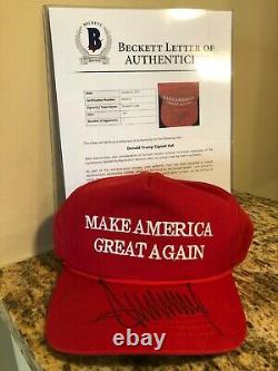 President Donald Trump Signed Official Red Maga Hat Autograph Beckett Bas Coa