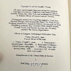 President Donald Trump The Art Of The Deal Book with a signed 3 x 5 index card