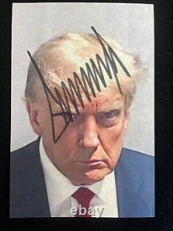 President Donald Trump signed Mugshot Print JSA LOA Rare Bold Auto read Z1803