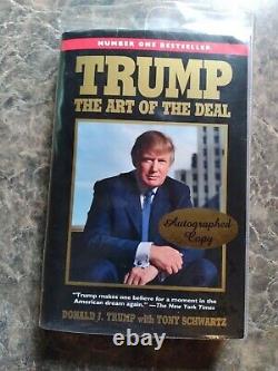 The Art of the Deal paperback autographed by Donald Trump with COA