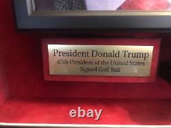 Balle de golf signée par Donald Trump en tant que président, certifiée JSA avec cadre personnalisé.