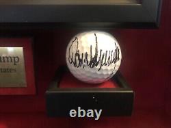 Balle de golf signée par Donald Trump en tant que président, certifiée JSA avec cadre personnalisé.