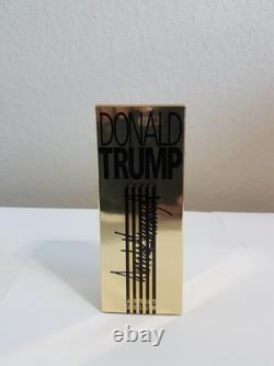 COFFRET DE COLOGNE SIGNE EN ENTIER PAR LE PRÉSIDENT AMÉRICAIN DONALD TRUMP avec avis rapide PSA évalué