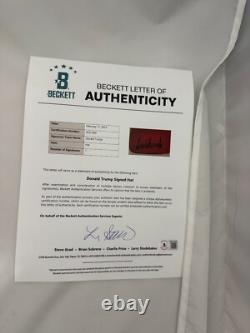 Chapeau MAGA (Rouge) dédicacé par Donald Trump avec lettre d'authenticité Beckett
