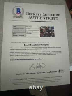 Le président Donald Trump a signé 11x14 avec LOA de Beckett