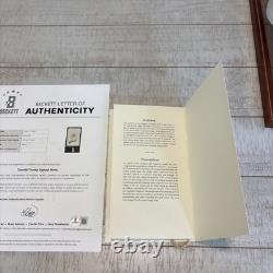 Menu du déjeuner inaugural signé en pleine signature de Donald Trump 2025, certificat Beckett