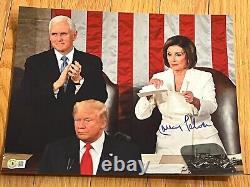 NANCY PELOSI A SIGNÉ UNE PHOTO AUTOGRAPHIÉE 11x14 DE DONALD TRUMP AVEC BECKETT BAS COA