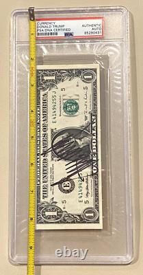 Président Donald Trump a signé un billet de 1 dollar, autographié authentifié par PSA.